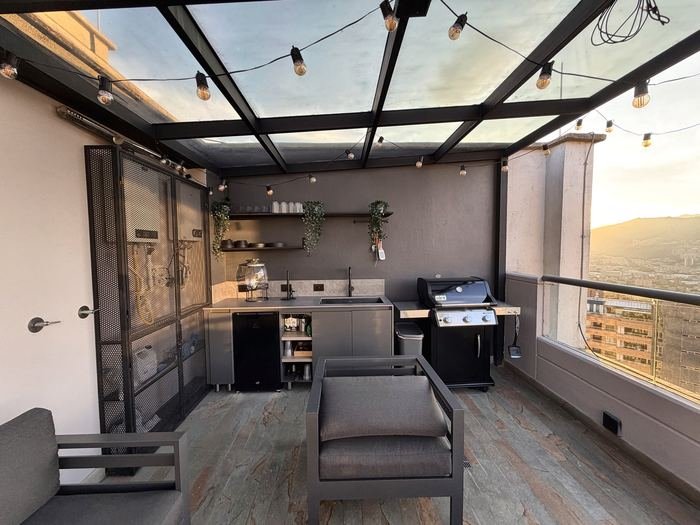Cocina de terraza y zona de asados